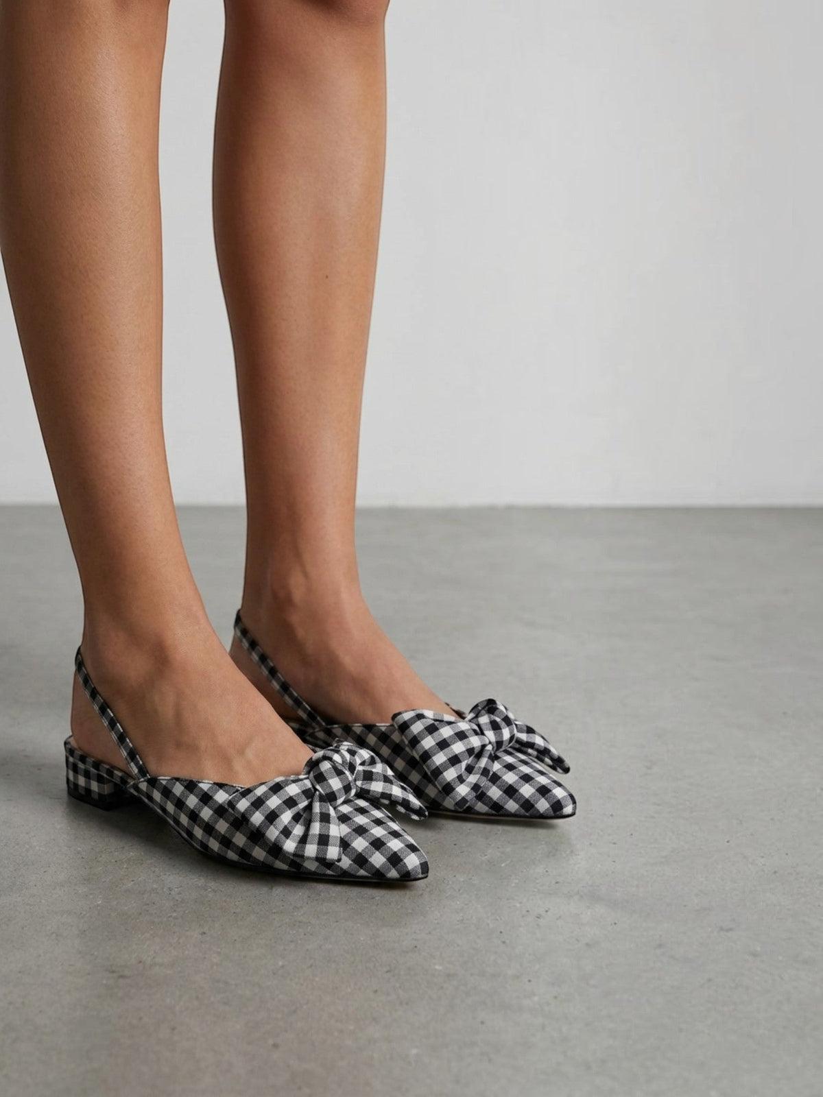 Zapatos destalonados Aveline con lazo y tacón bajo